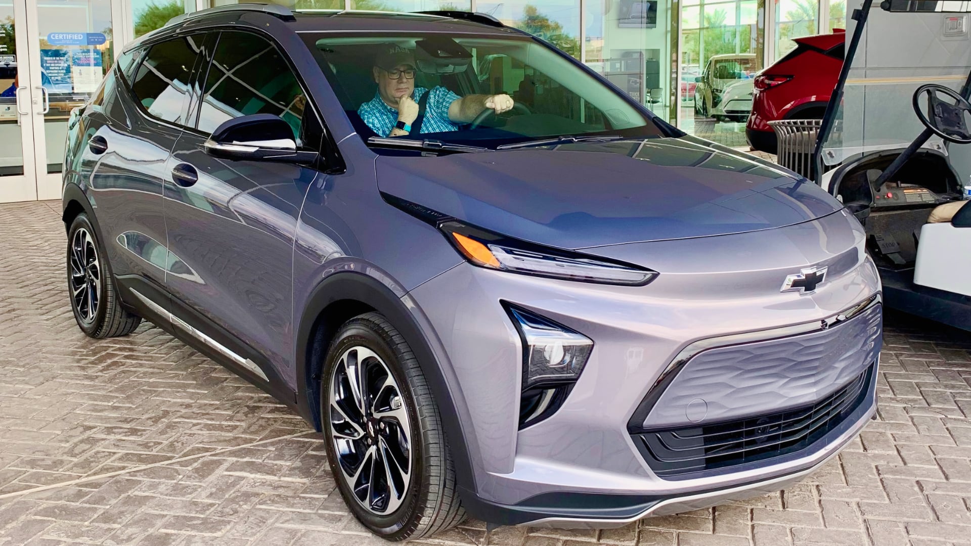 Your author receiving instruction about piloting his Chevy Bolt.