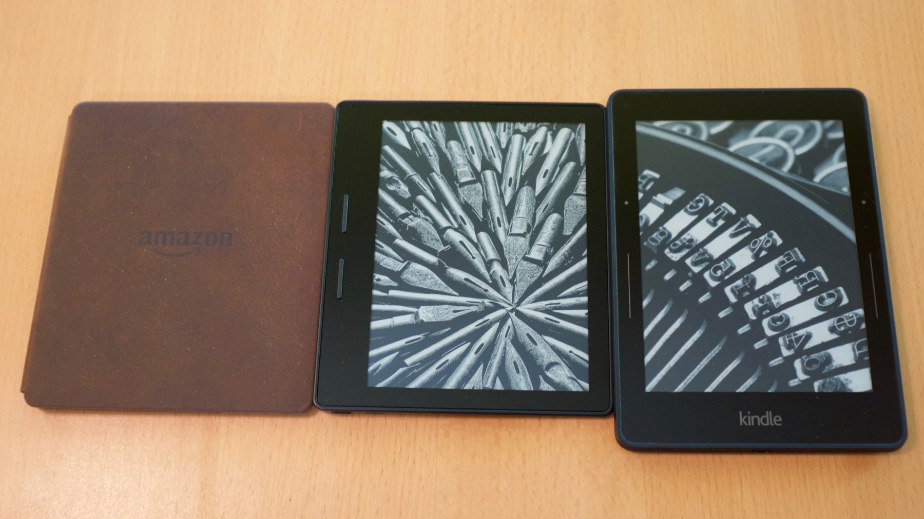 Oasis Walnut leather cover, the Oasis itself, and a Voyage.